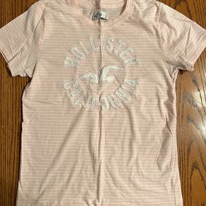 Hollister women’s medium pink and white striped logo tee